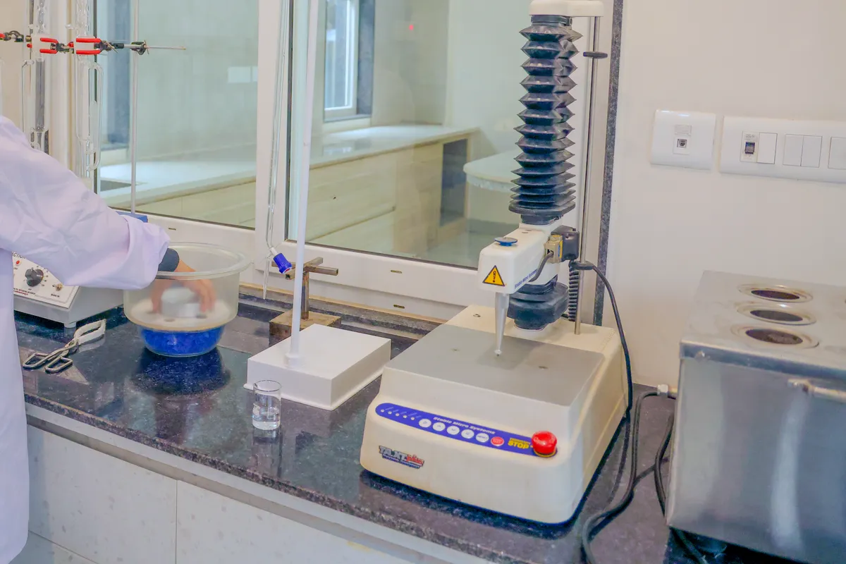 Lab bench with a desiccator and a texture analyser at Rudrapur